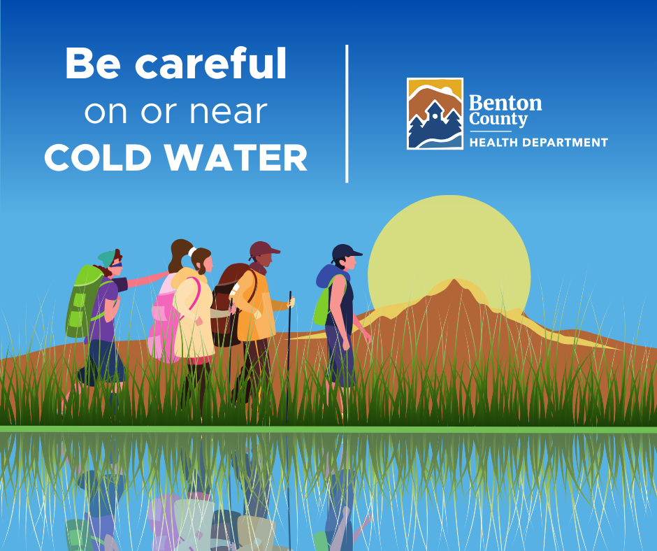 People walking near a body of water with text, "Be careful on or near cold water."