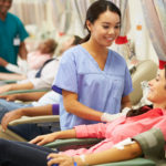 People donating blood at a blood drive.