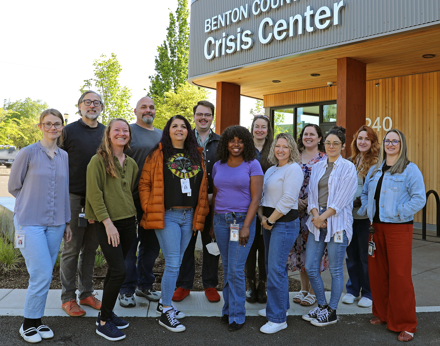 Members of the Benton County crisis services team stand in front of the Benton County Crisis Center in downtown Corvallis.