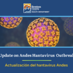 Graphic from the Benton County Health Department showing a close‑up illustration of virus particles with the text ‘Update on Andes Hantavirus Outbreak’ and its Spanish translation ‘Actualización del hantavirus Andes.’