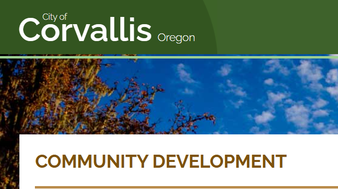 Banner showing the City of Corvallis, Oregon logo above a section header labeled ‘Community Development’ with a blue sky and tree branches in the background.